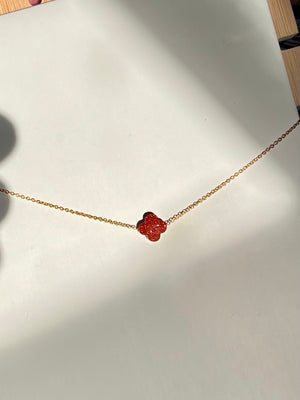 Glittery red clover necklace