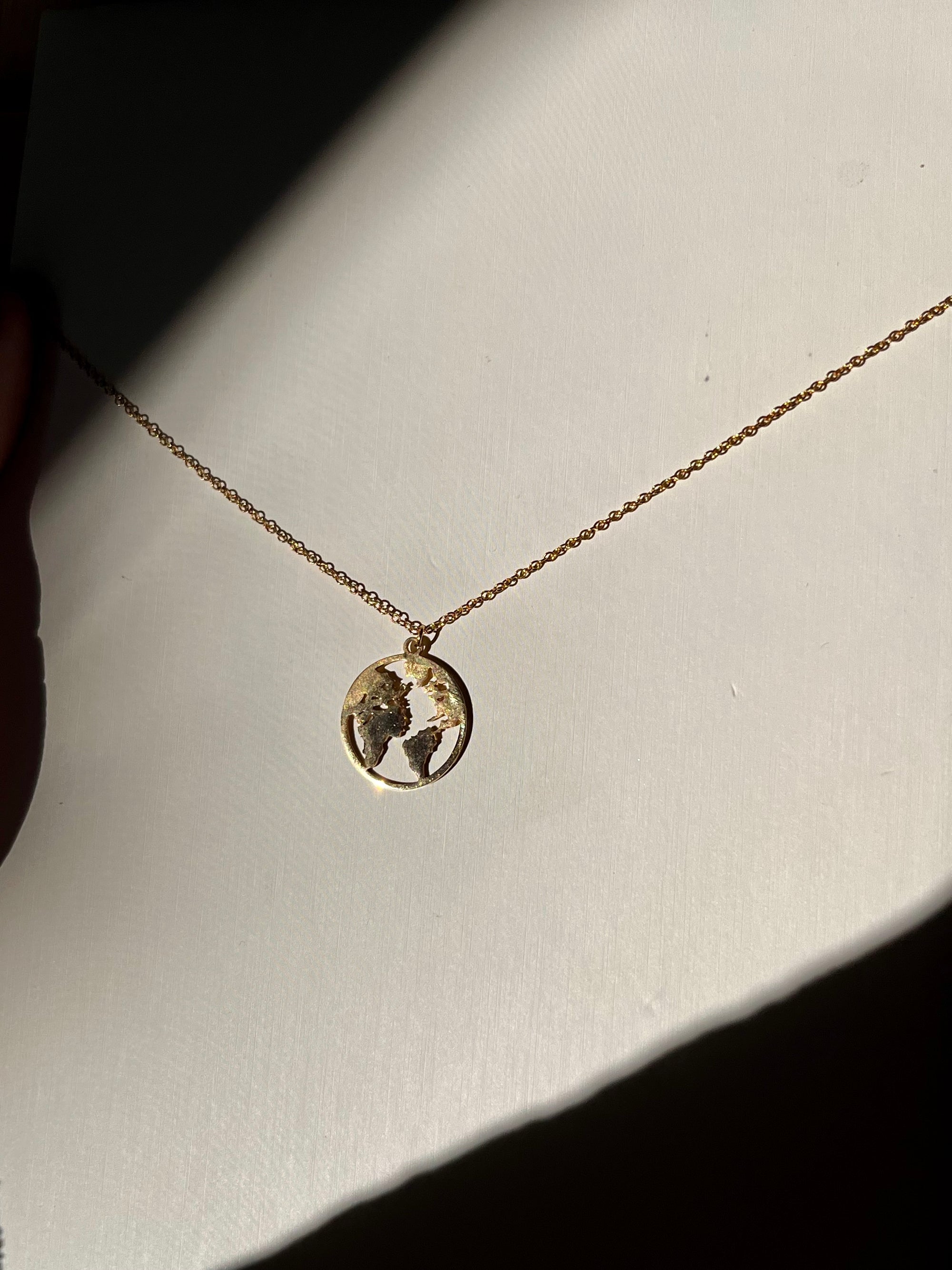 Gold “EARTH” necklace