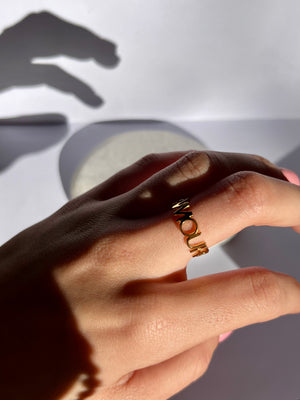 “LOVE” ring in gold stainless steel